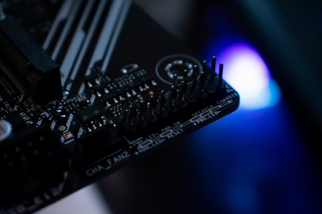 Close-up of circuit board with glowing blue lights representing technology innovation